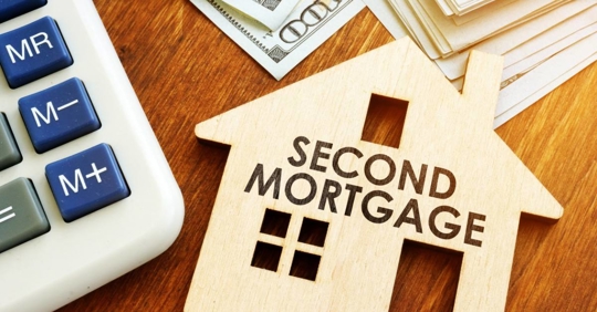 Second Mortgage written on wooden home