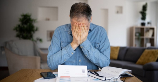 Man stressed with financial mistakes